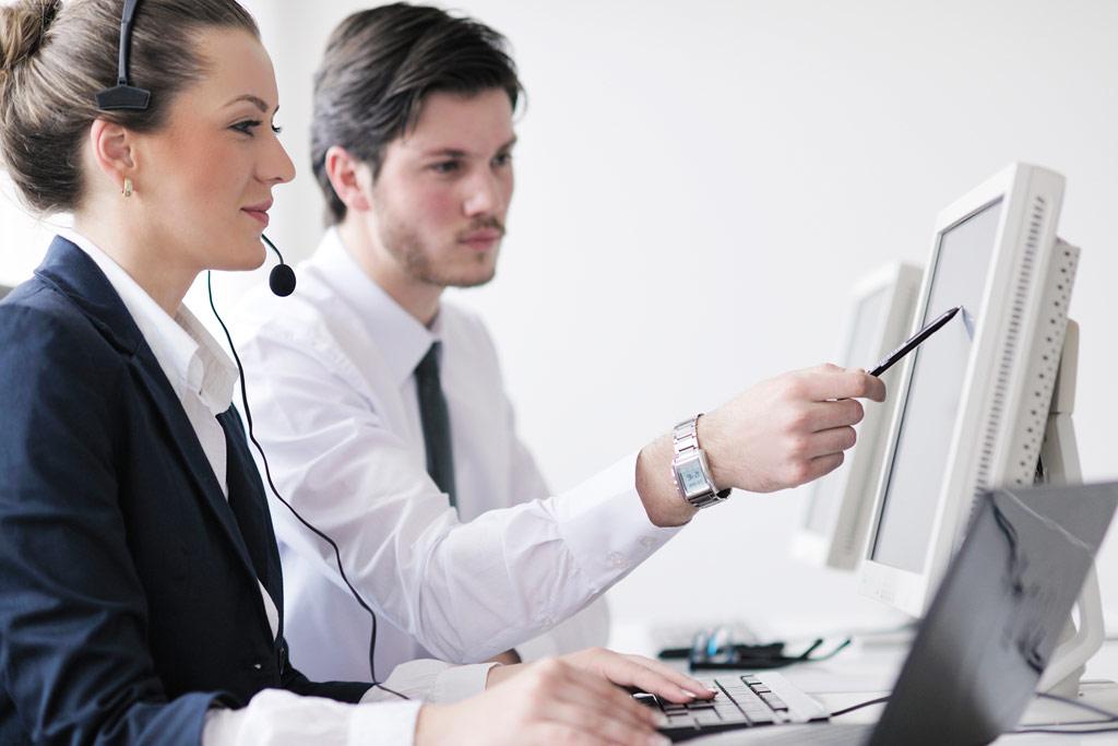 business people group with  headphones giving support in  help desk office to customers, manager giving training and education instructions